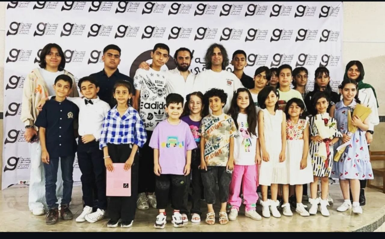 Mohammadali Rezaei with a large group of students after a recital