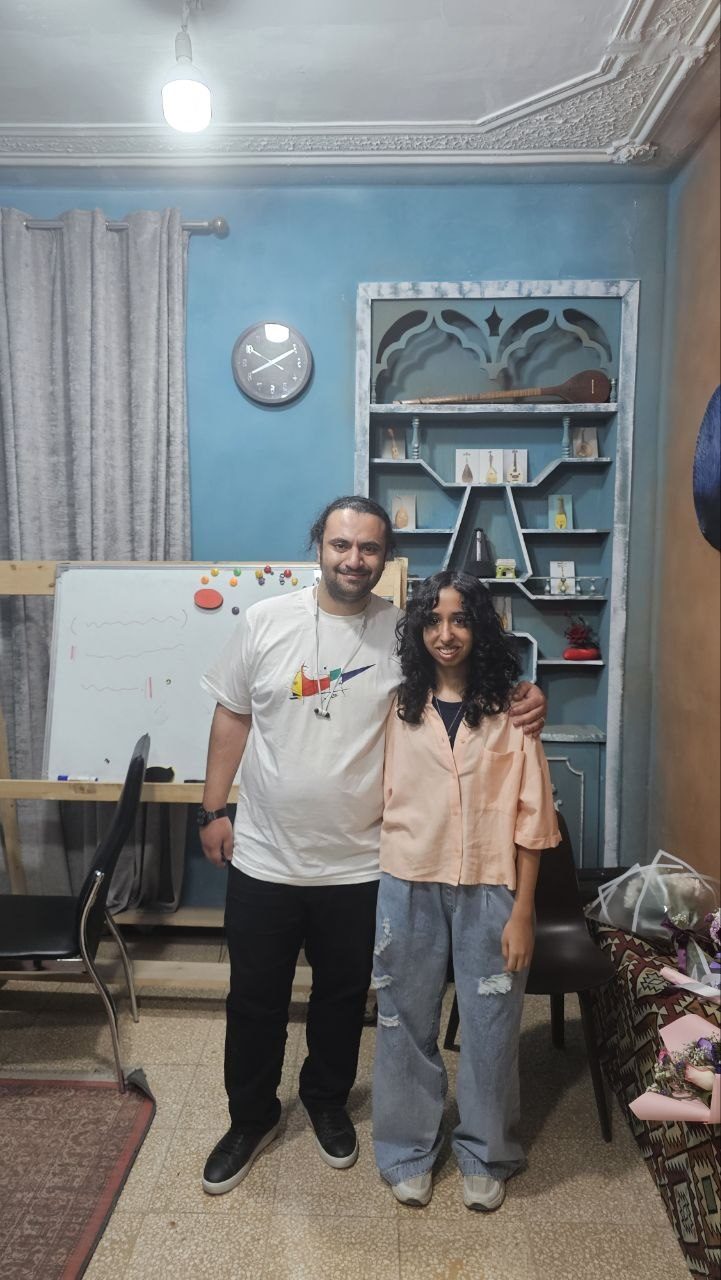 Mohammadali Rezaei with a student in the teaching studio